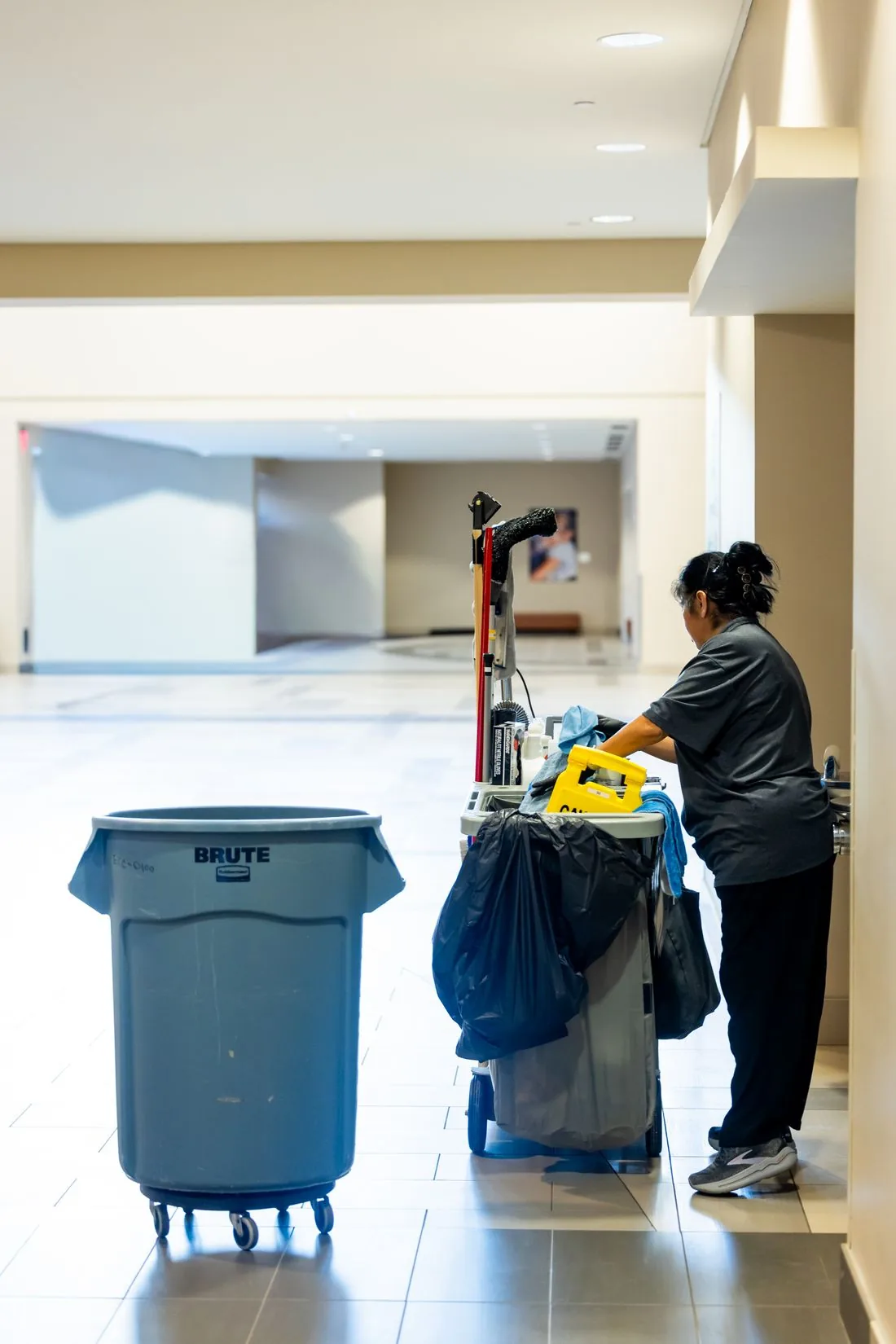 Janitorial cart in an office corridor
